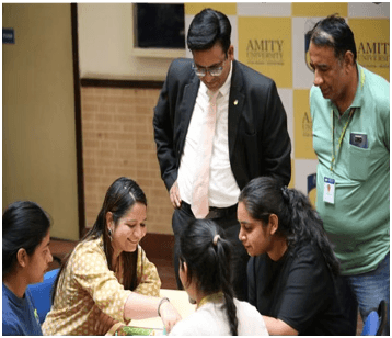 Dr Ajay Rana presiding over an academic council meeting