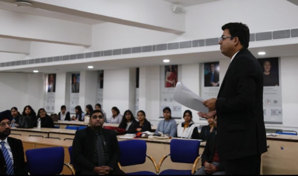 Dr Ajay Rana addressing students in a lecture hall