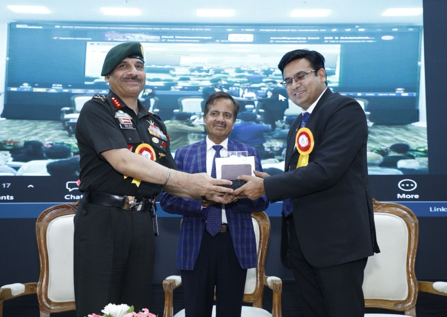 Dr Ajay Rana presenting a memento to an Army Officer