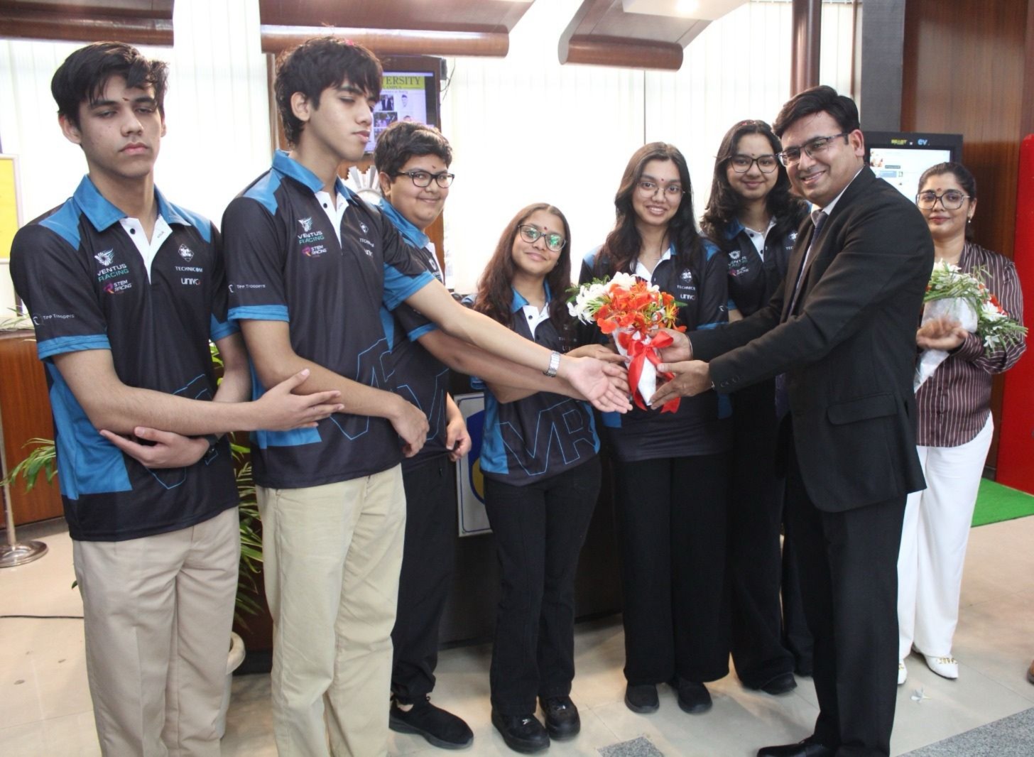 Dr Ajay Rana felicitating the Ventus Racing student team